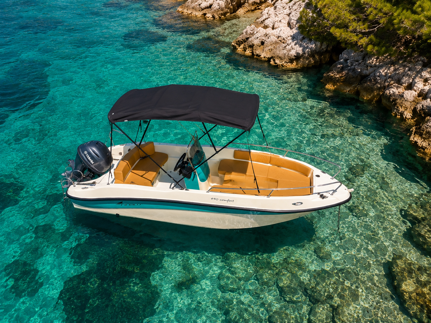 Riptide Watersports boat from above in clear Rhodes water