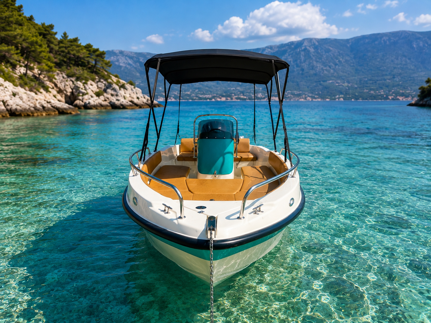 Sheltered turquoise bay seen from the front of the Riptide boat